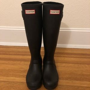 Matte black tall Hunter boots